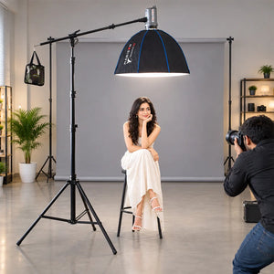 desc: The Harison Bahubali Boom Stand and Boom Arm support a heavy studio light with the Octa 80 softbox overhead. Engineered for high load-bearing capacity, this setup ensures stability, convenient positioning, and portability for professional top-lighting applications.