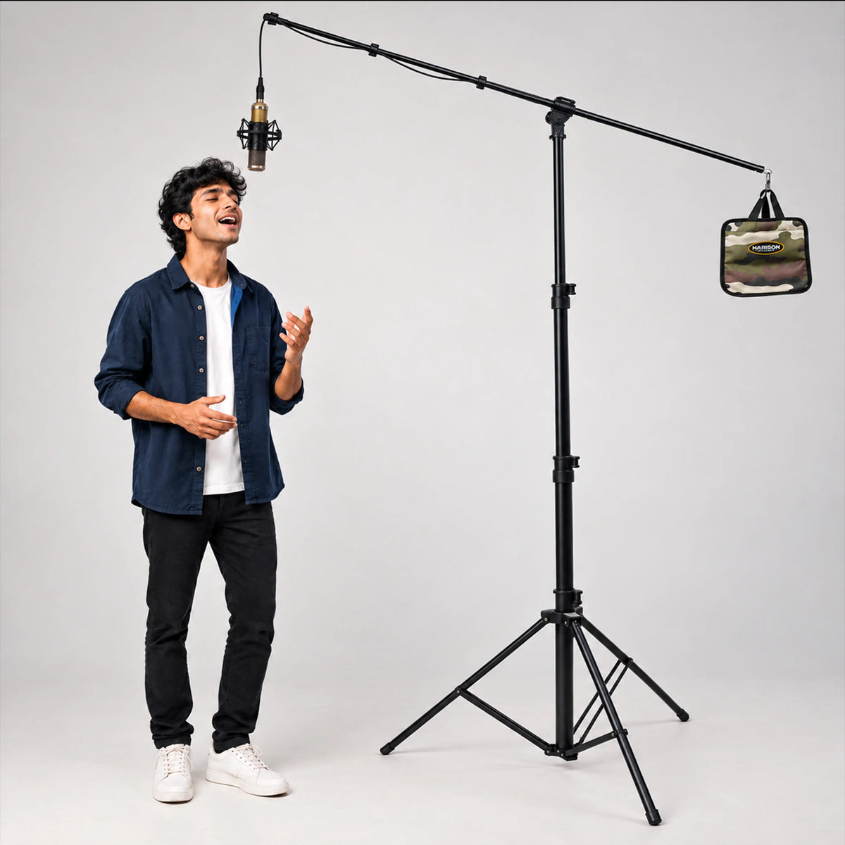 desc: The HARISON MiniTower AC Light Stand paired with the HARISON Boom Arm Mini transforms into a versatile, professional microphone stand. Its adjustable height, extended boom reach and stable tripod base provide flexible microphone positioning—ideal for singers, podcasters, voice artists and content creators seeking a reliable, space-efficient studio solution.