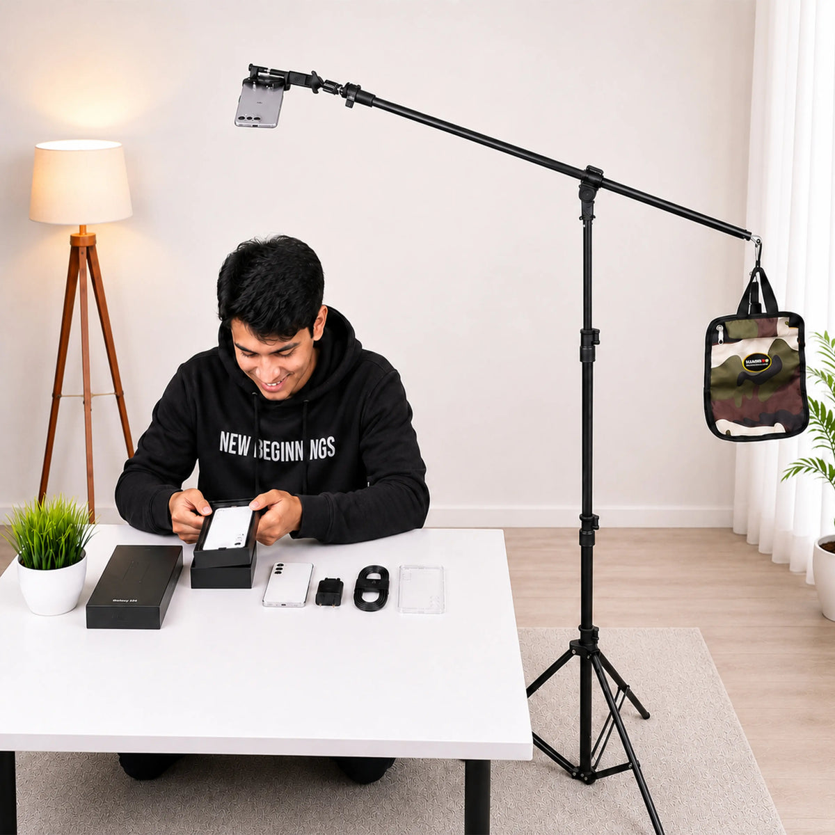 desc: The OH1 setup enables you to set up a compact, stable overhead setup for unboxing photography and videography. The HARISON Boom arm (Mini) positions the phone / camera directly above the table, capturing products, hands, and details clearly without obstructing the workspace.